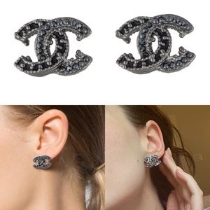 Gunmetal Chanel CC stud earrings featuring crystal embellishments
